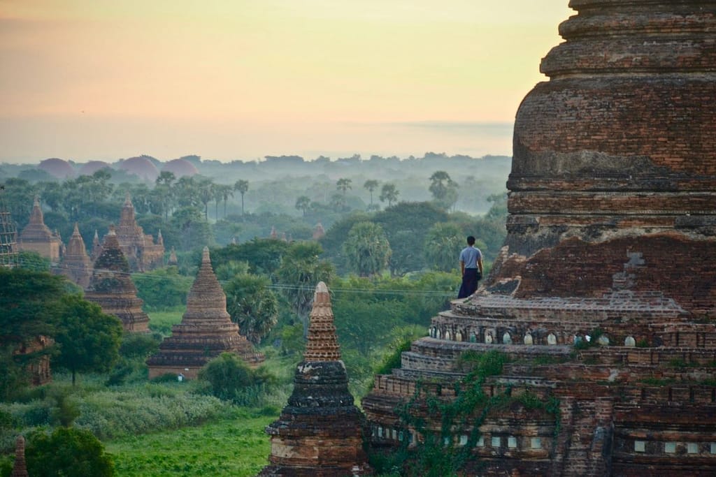 Asia budget travel destinations person standing on building in Myanmar